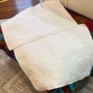 Two White Matelasse Standard Pillow Shams